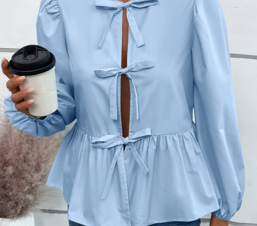 Ivy Lane Peplum Tied Long Sleeve Blouse