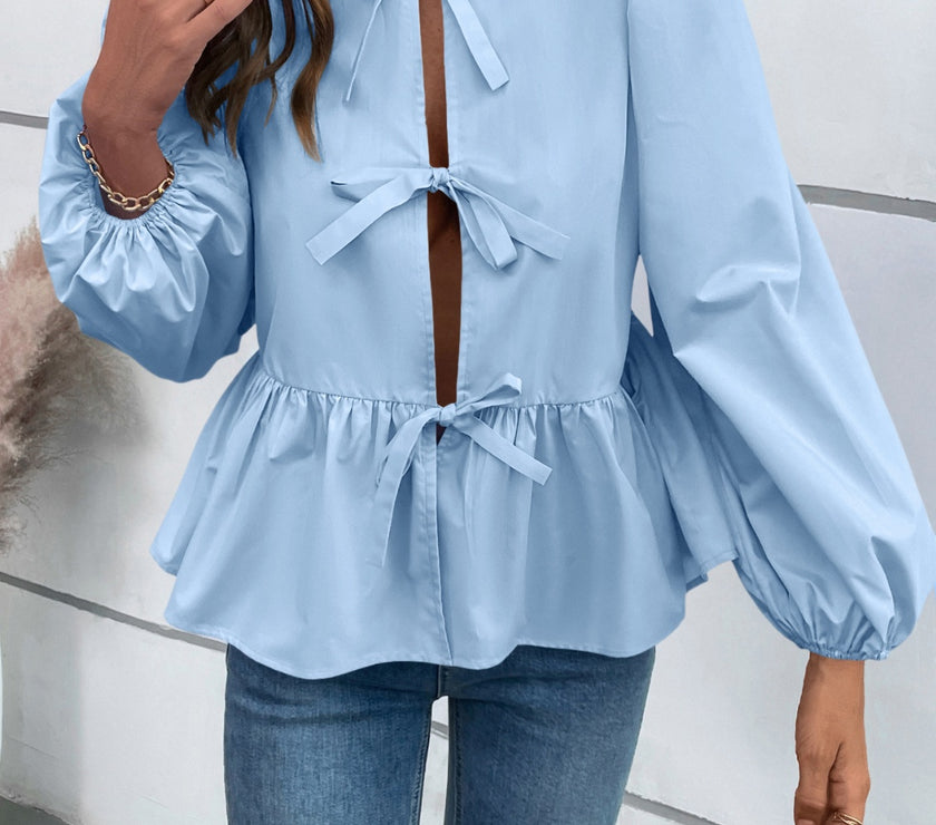 Ivy Lane Peplum Tied Long Sleeve Blouse