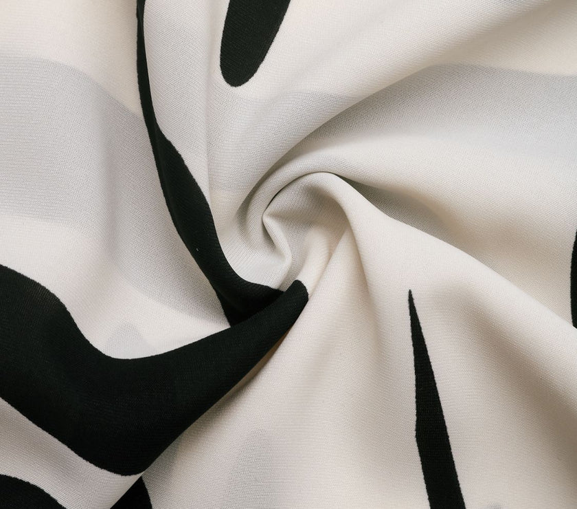 Perfee Printed Notched Half Sleeve Blouse