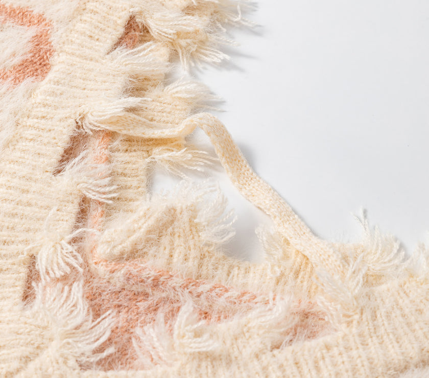 Distressed Trim Leopard V-Neck Sweater