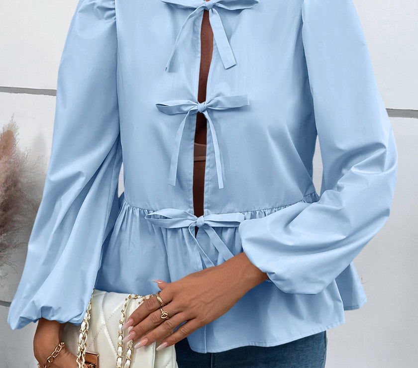 Ivy Lane Peplum Tied Long Sleeve Blouse