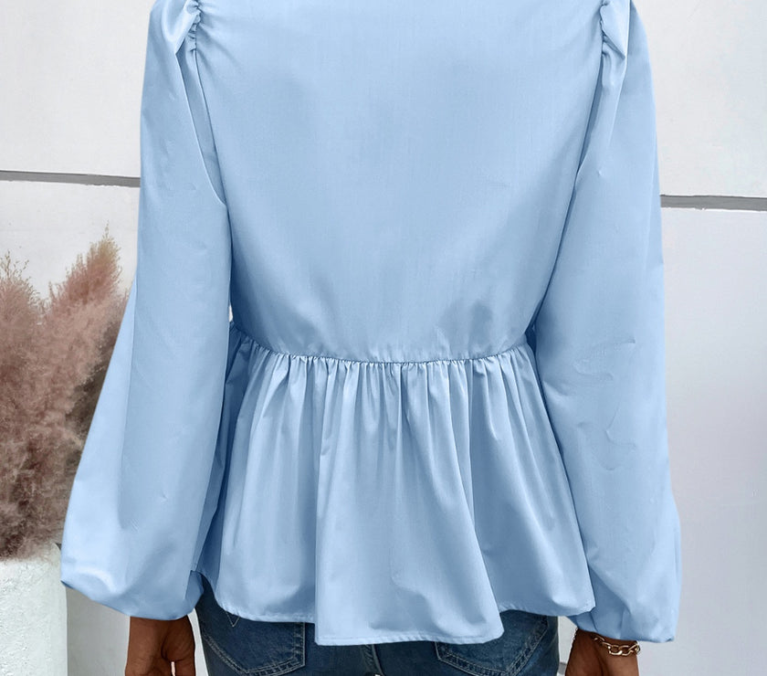 Ivy Lane Peplum Tied Long Sleeve Blouse