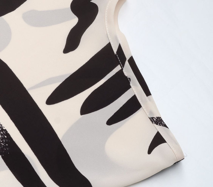 Perfee Printed Notched Half Sleeve Blouse