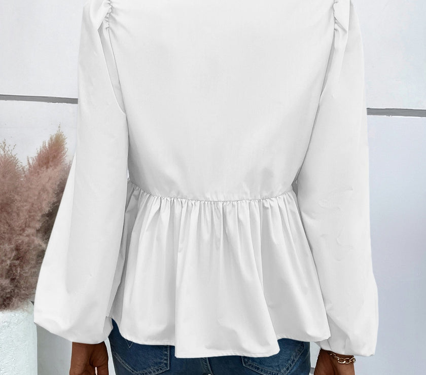 Ivy Lane Peplum Tied Long Sleeve Blouse