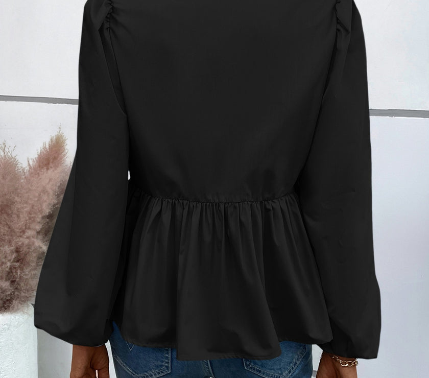 Ivy Lane Peplum Tied Long Sleeve Blouse