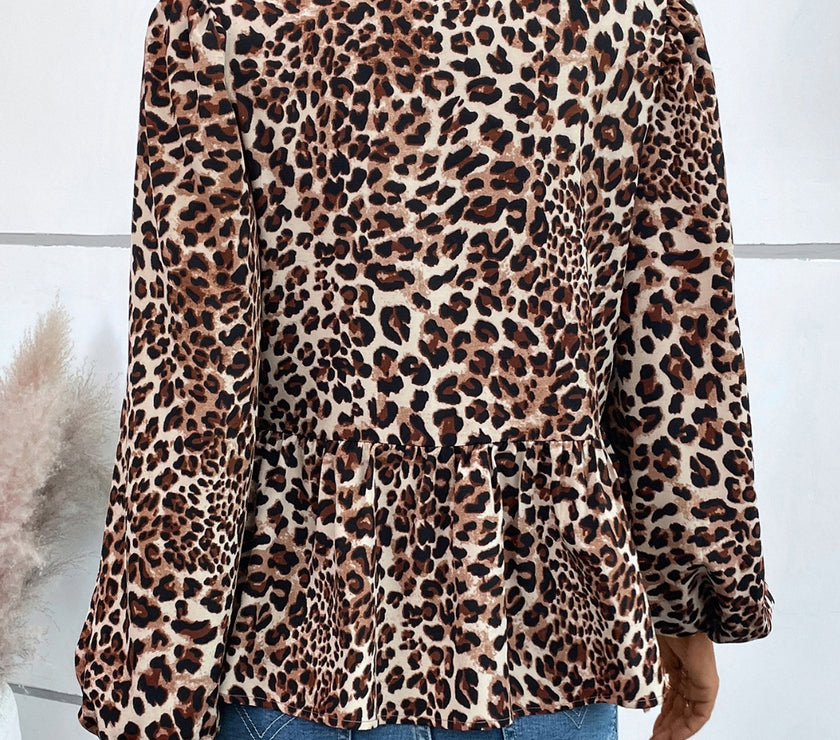 Ivy Lane Peplum Tied Long Sleeve Blouse