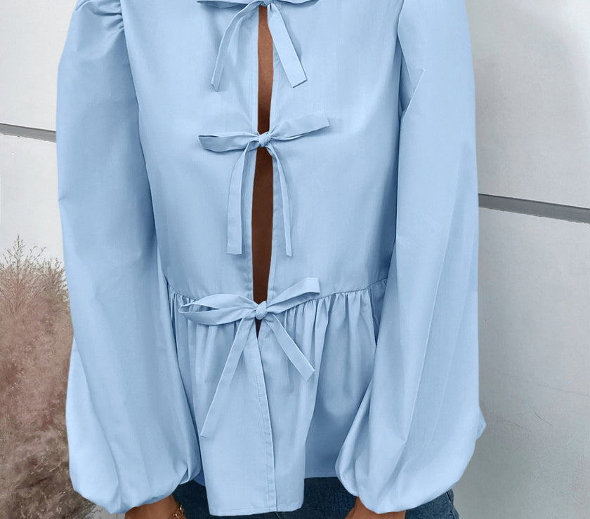 Ivy Lane Peplum Tied Long Sleeve Blouse