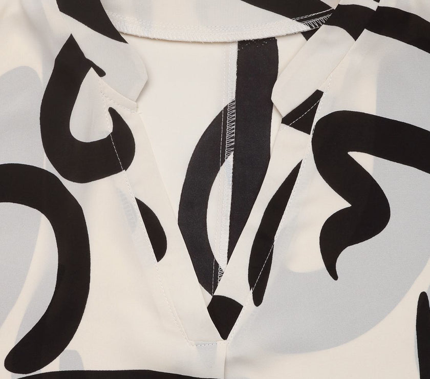 Perfee Printed Notched Half Sleeve Blouse